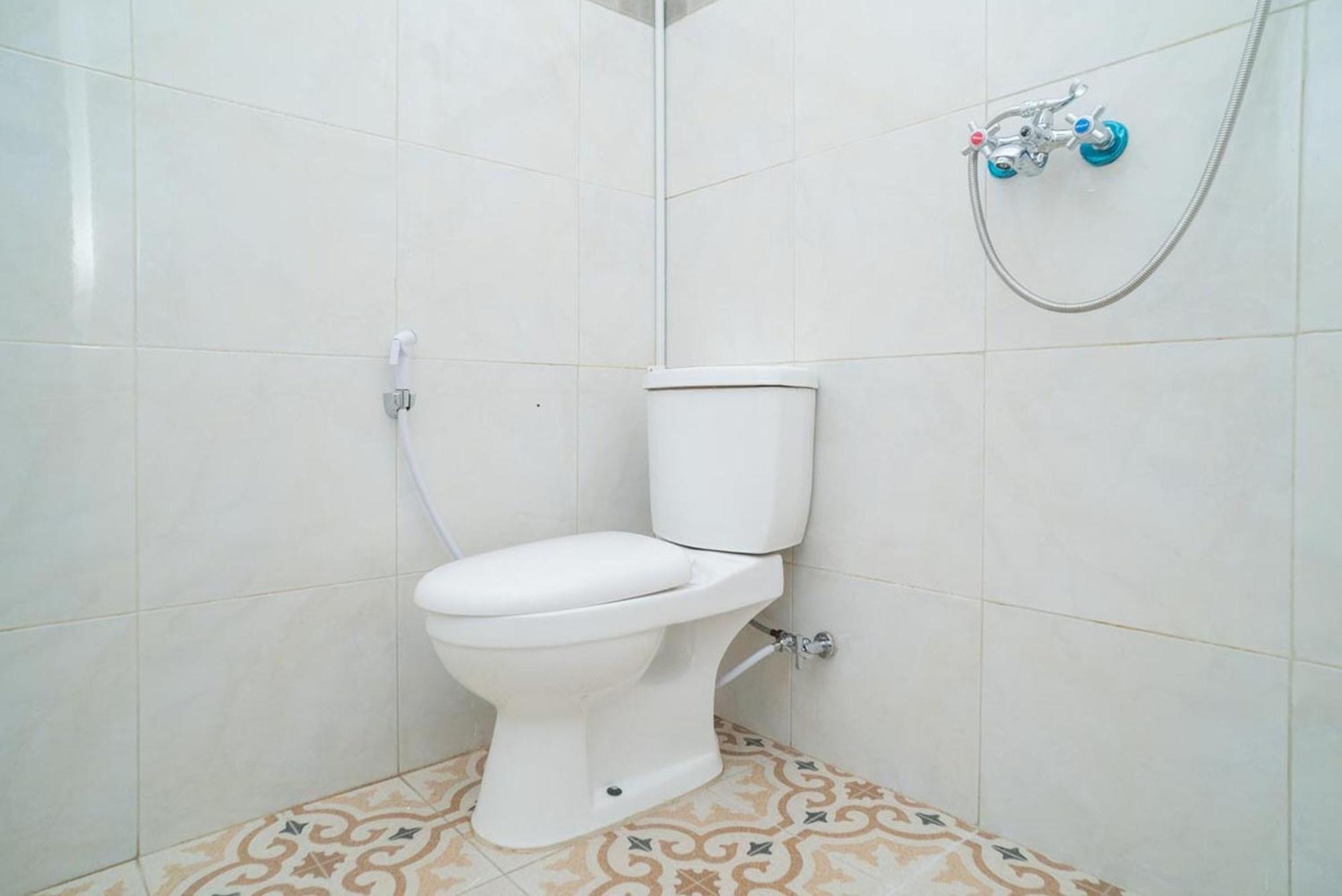 Sans Hotel Queen Batu Sumber Brantas Chambre photo
